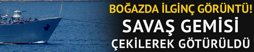 Arızalı savaş gemisi römorkör tarafından çekildi