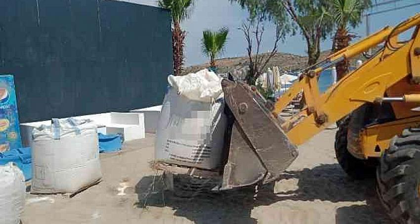 Belediyesi ekipleri 'beyaz kum' serimine engel oldu
