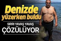 Denizde yüzerken parlaklığı fark edince... Görür görmez jandarmaya haber verdi