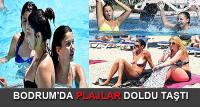 Muğla'da turizm merkezlerinde tatilciler denizin keyfini çıkarıyor